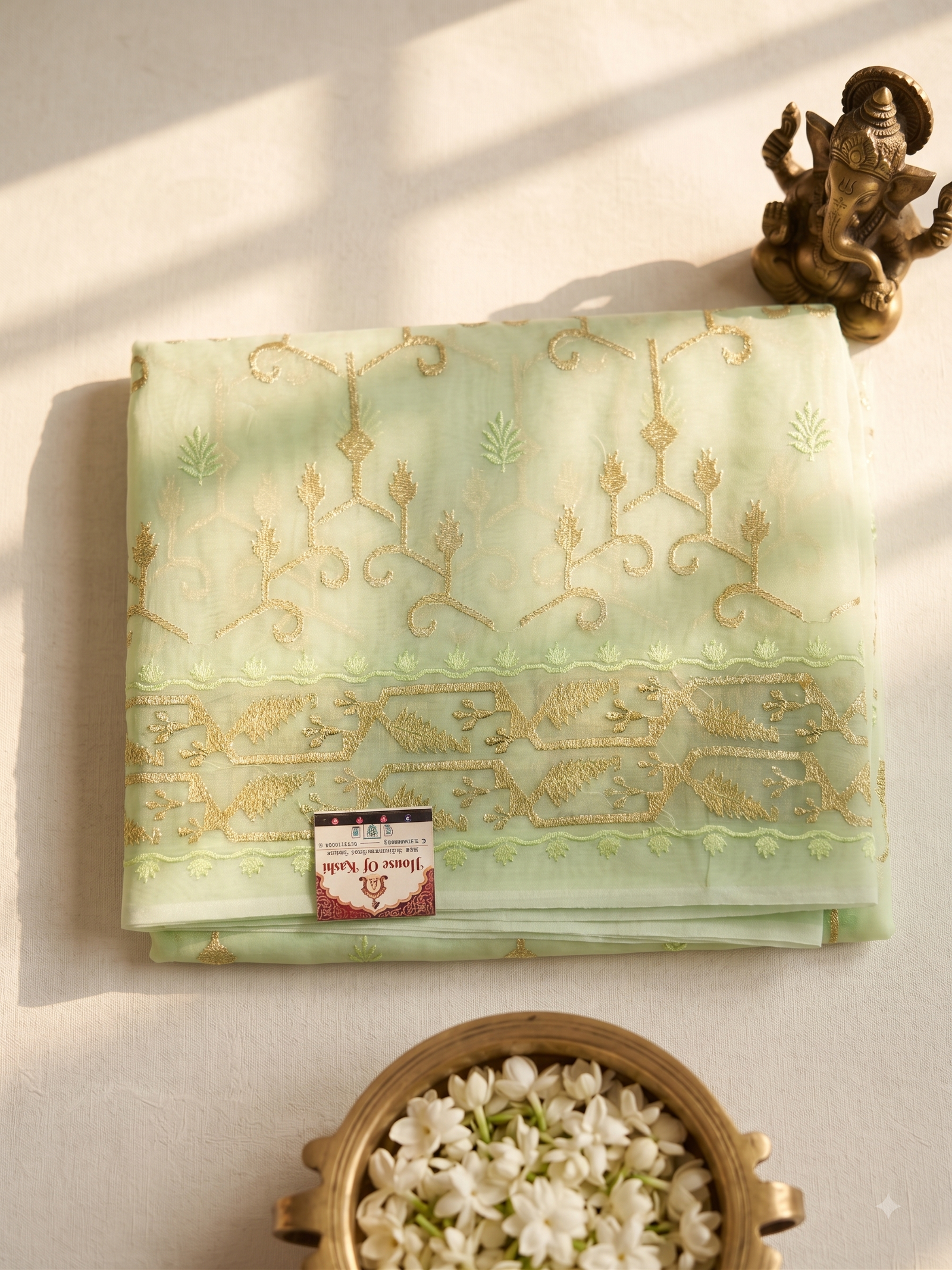 Mint Green Sheer Organza Silk Saree with Gold Zari Jaal & Resham Work